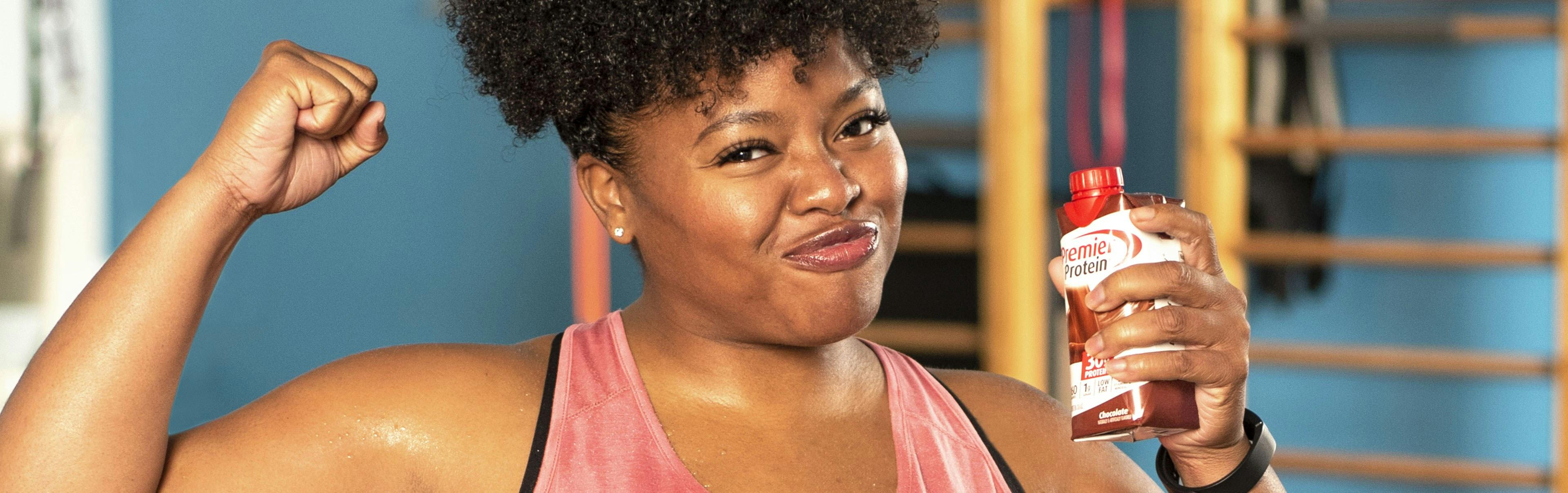 A women flexing her muscles.