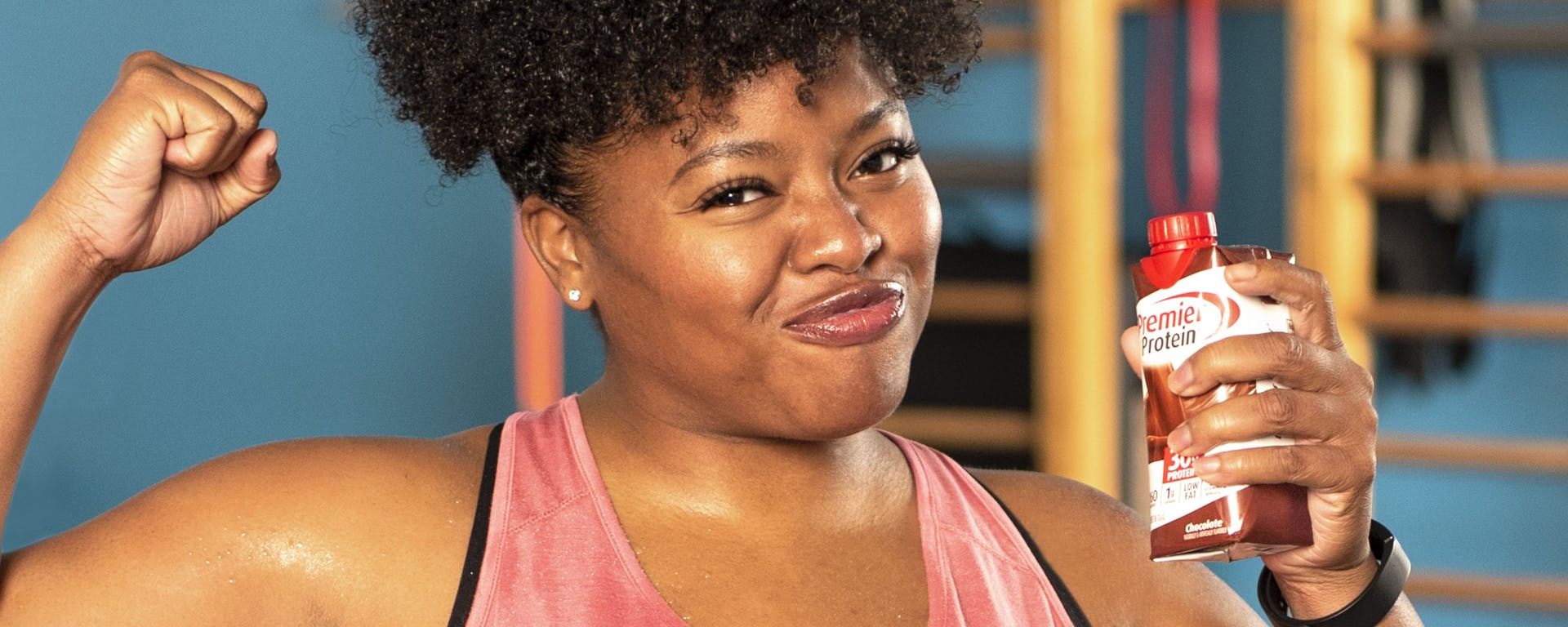 A women flexing her muscles.