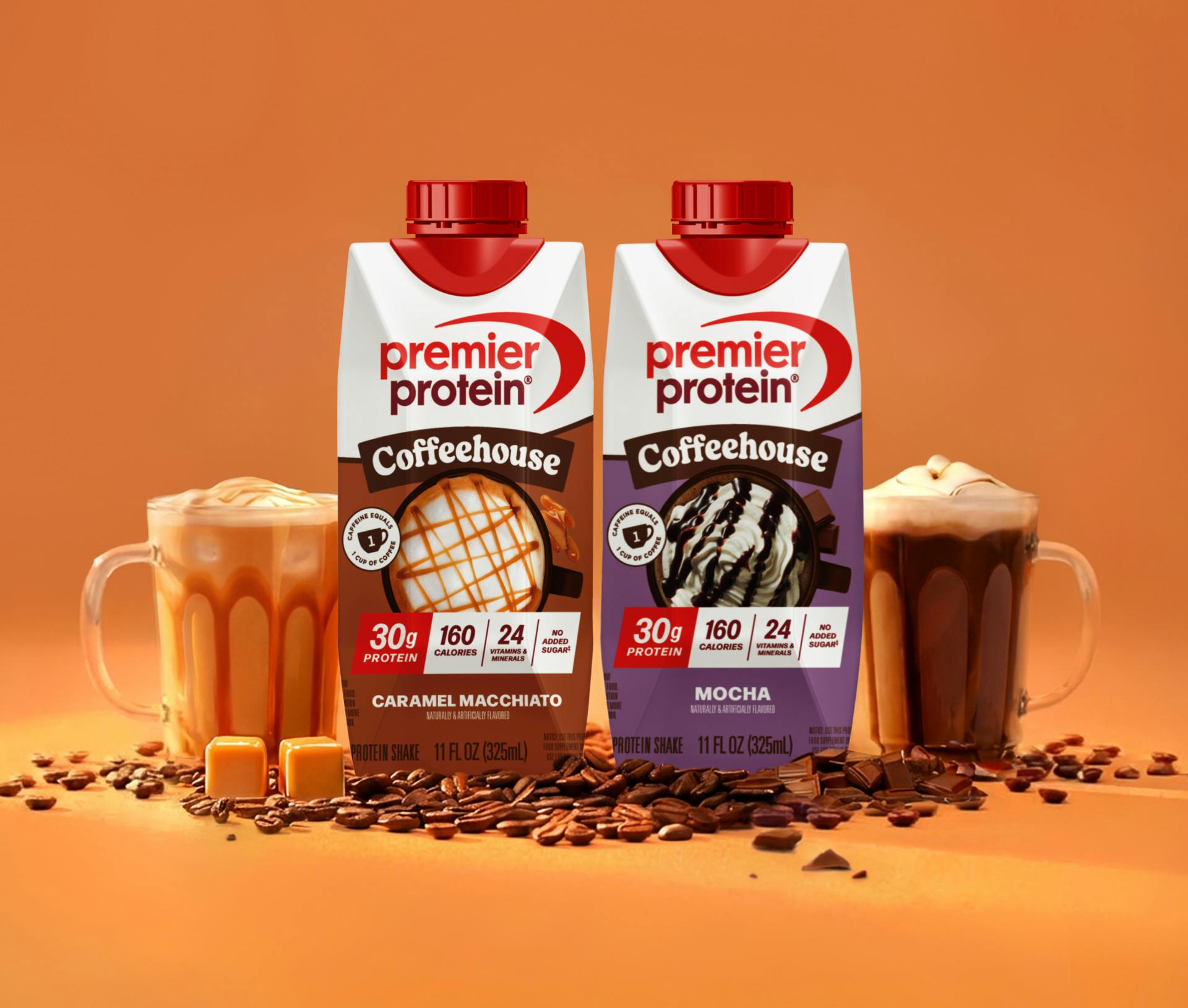 Premier Protein Coffeehouse Protein Shakes tetra bottles, and two cups filled with Coffeehouse Protein Shakes.