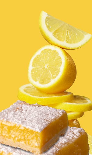 A pile of sliced lemons and cookies.